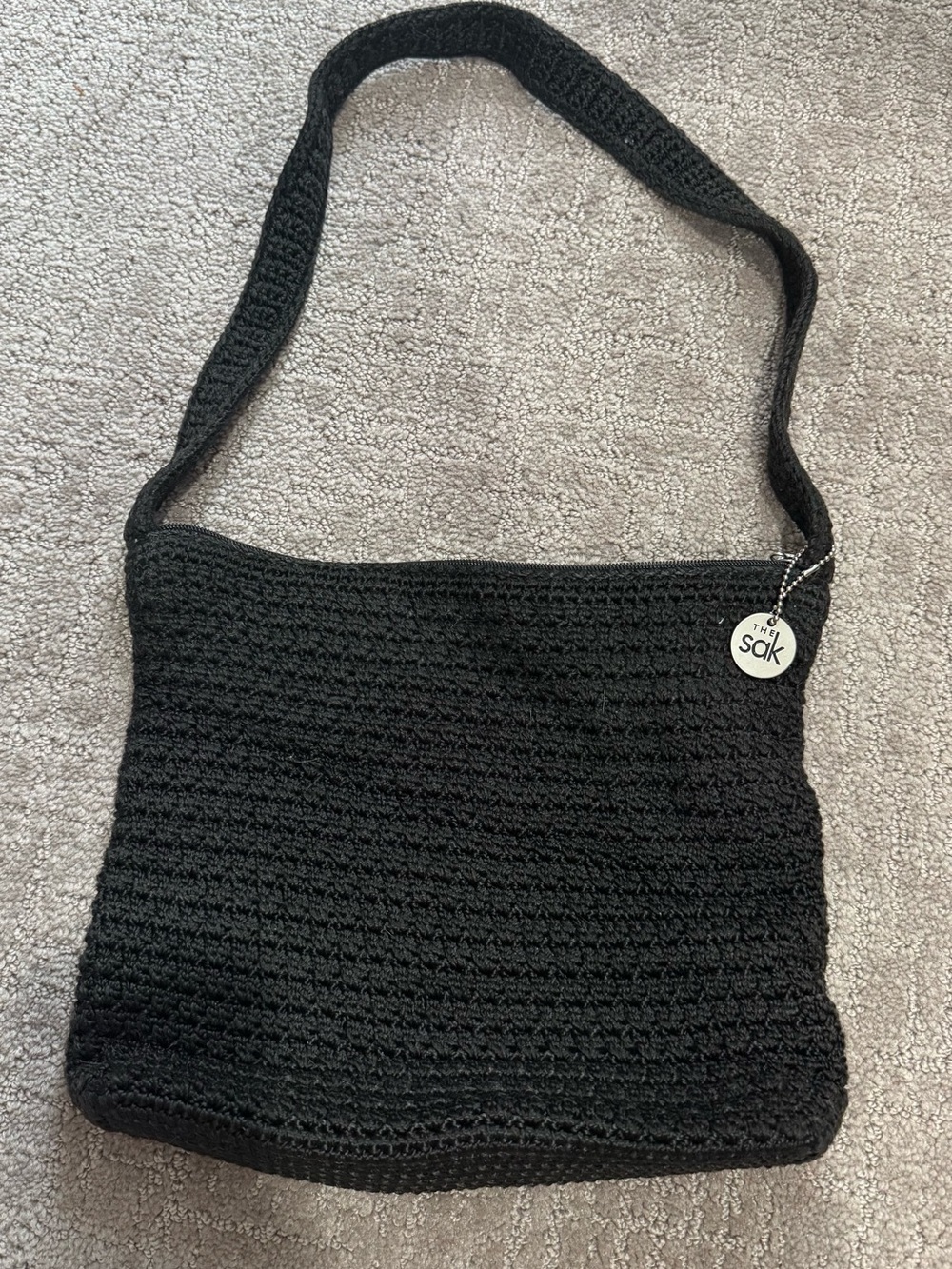 The Sak Black Crochet Shoulder Bag with Logo Charm